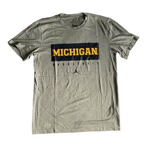 Jordan Michigan basketball Dri-Fit short sleeve shirt